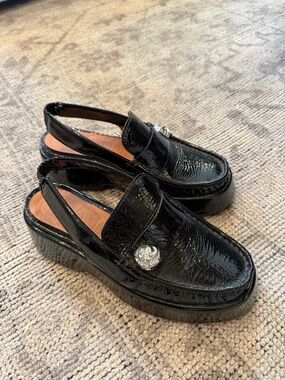 Ganni Shiny Black Slingback Platform Loafers with Silver Accent
